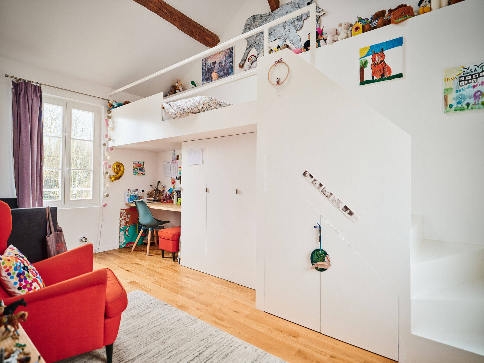 Chambre en mezzanine sous charpente